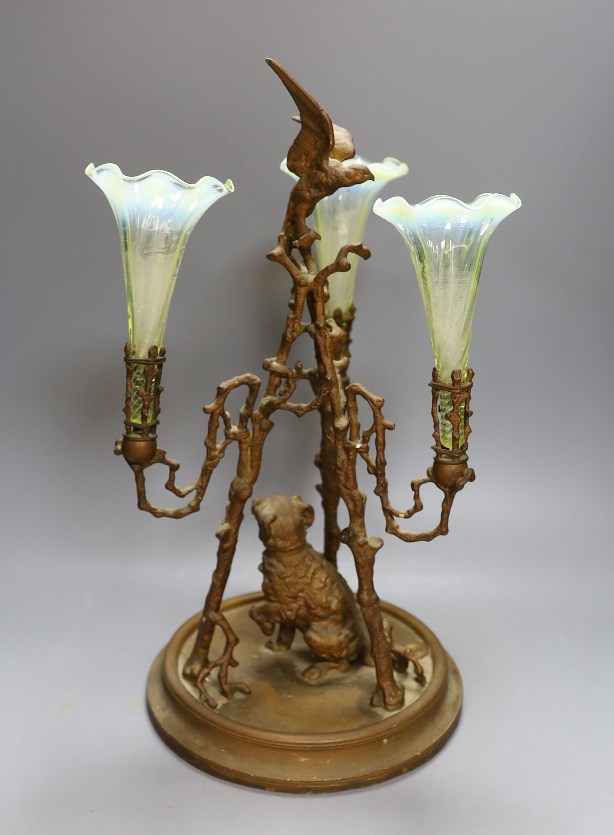 A 19th century 3 branch and spelter epergne decorated with a dog and bird - 41cm tall, with Vaseline glass vases